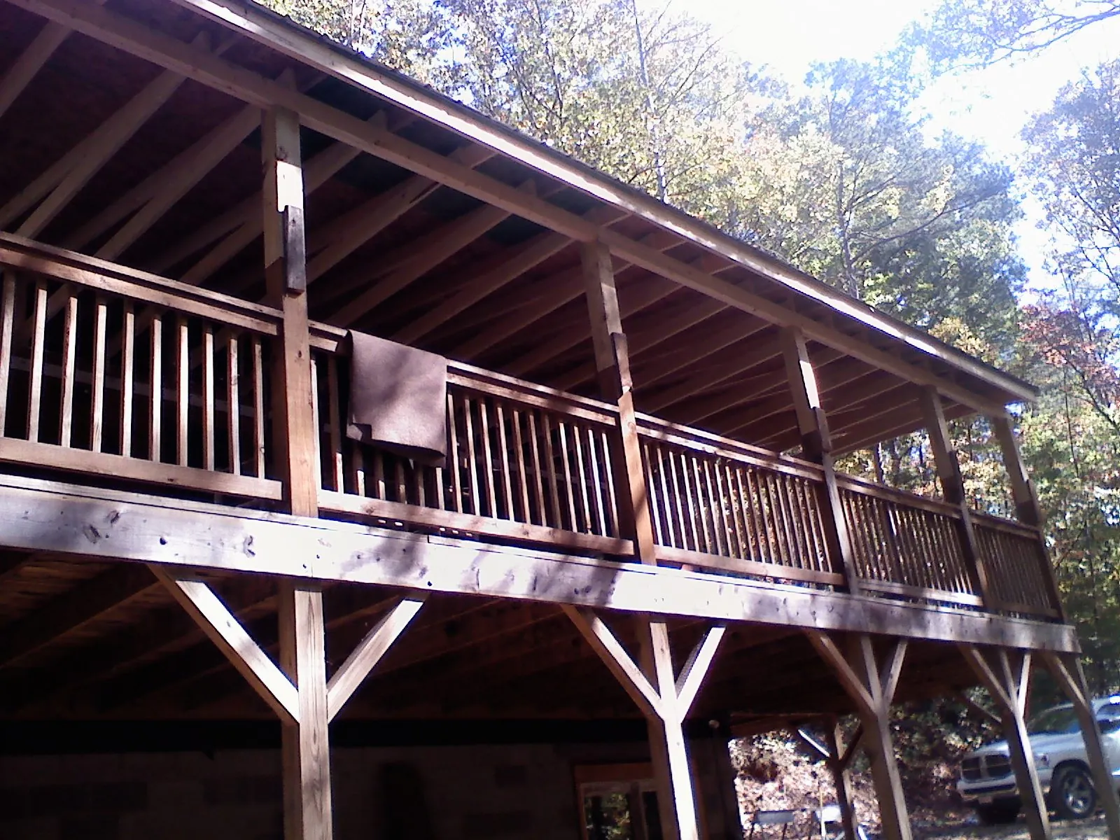 Timber framing under a new elevated porch and deck — Roof Leak Repair in Rye by Roofing Brothers